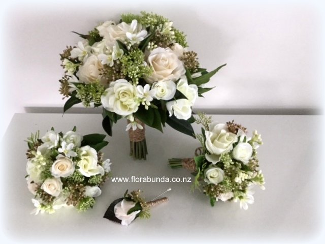 image shows Brides and 2 small bridesmaids bouquets with matching buttonhole. Price is for 1 Brides bouquet only
