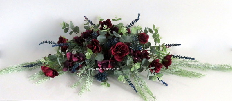 Blue burgundy long low table arrangement artificial