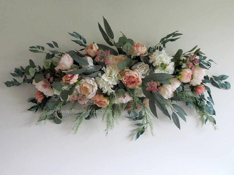 Archway flowers blush pink and eucalyptus