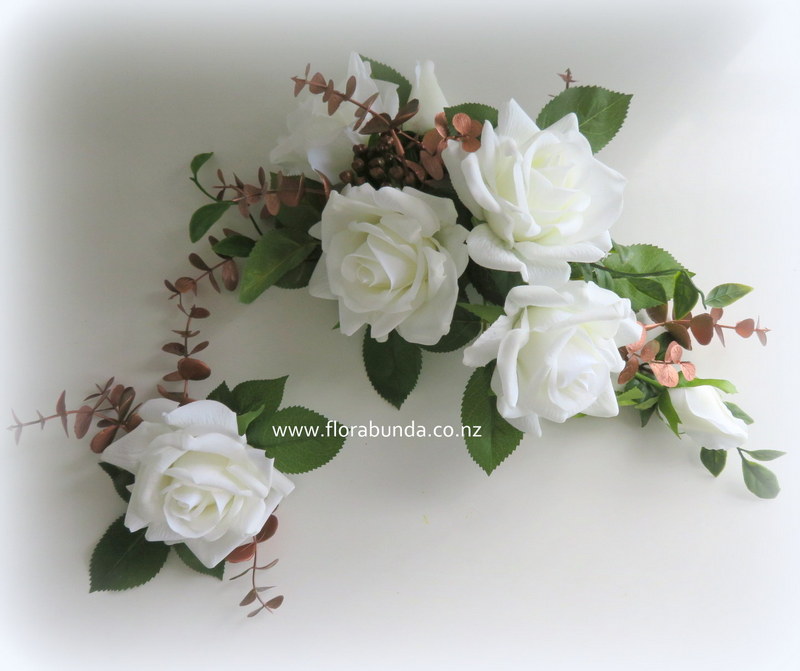 Rose gold cake flowers with white roses