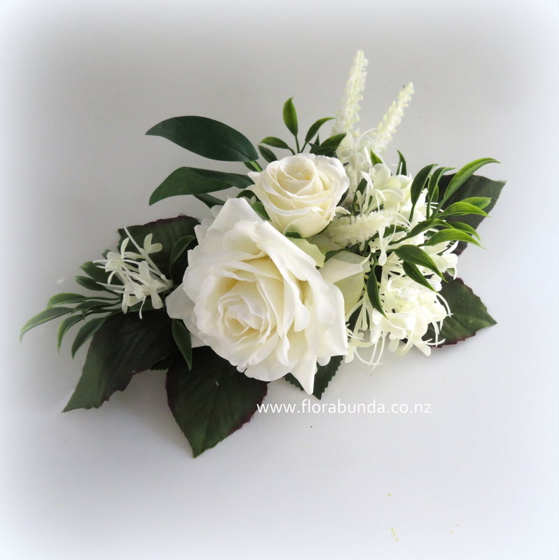 Emerald and white cake flowers