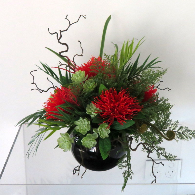 NZ Pohutukawa flowers in black vase