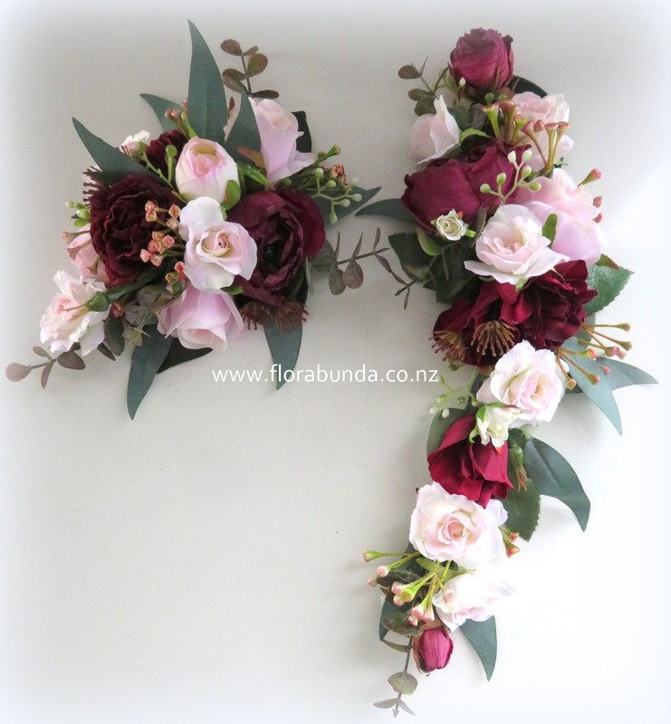Artificial burgundy cake flowers