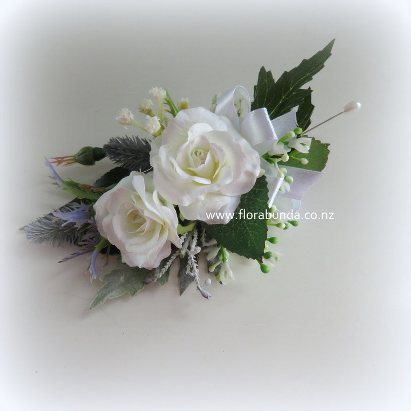Thistle with white mini rose corsage