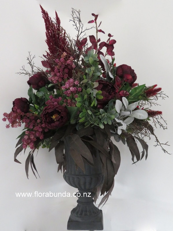 Black Urn with Large quality Flower Arrangement Dark red