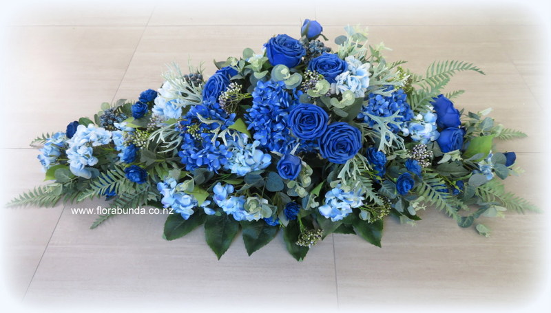 Blue floral casket spray