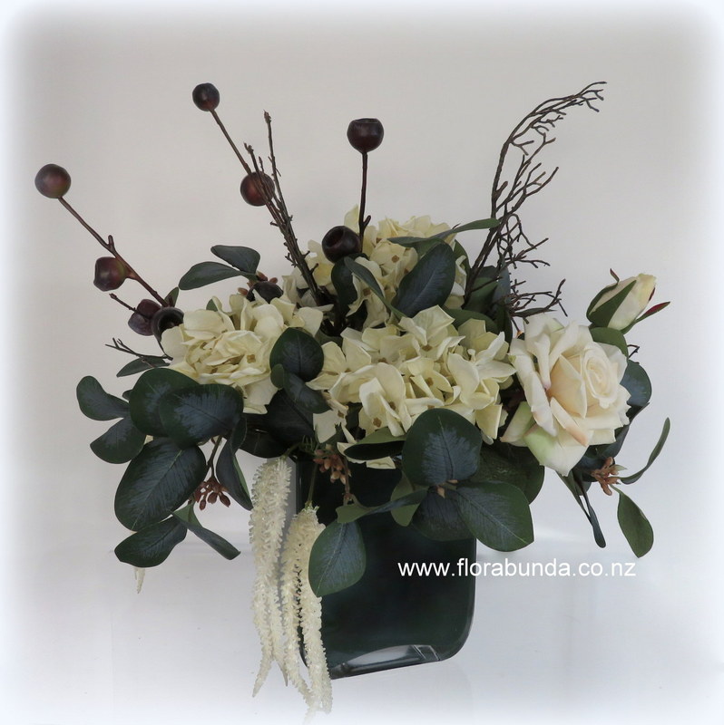 Cream and green dried natural look fake flower arrangement