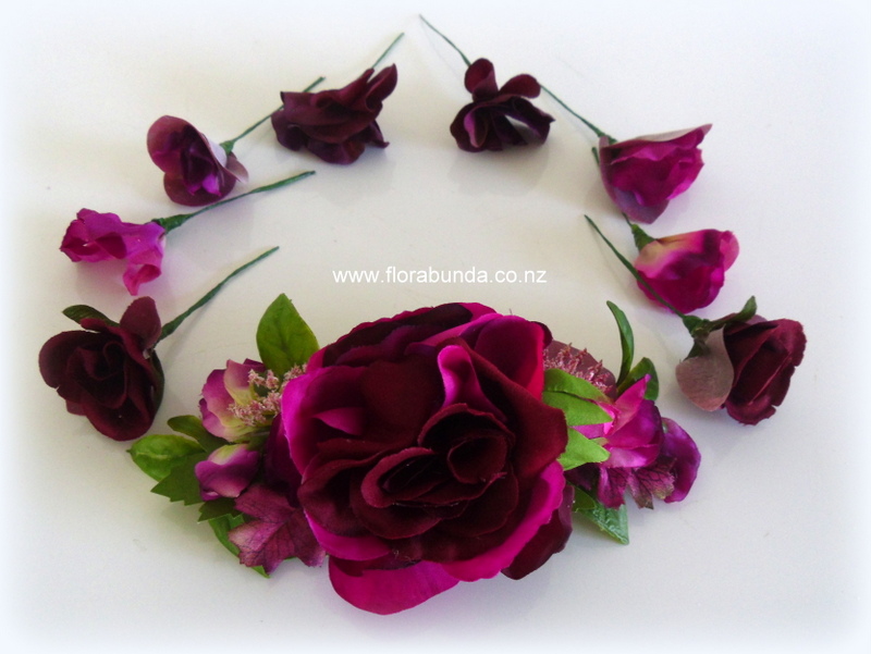 8 separate hair scatter pieces on wire with large flower spray on clip