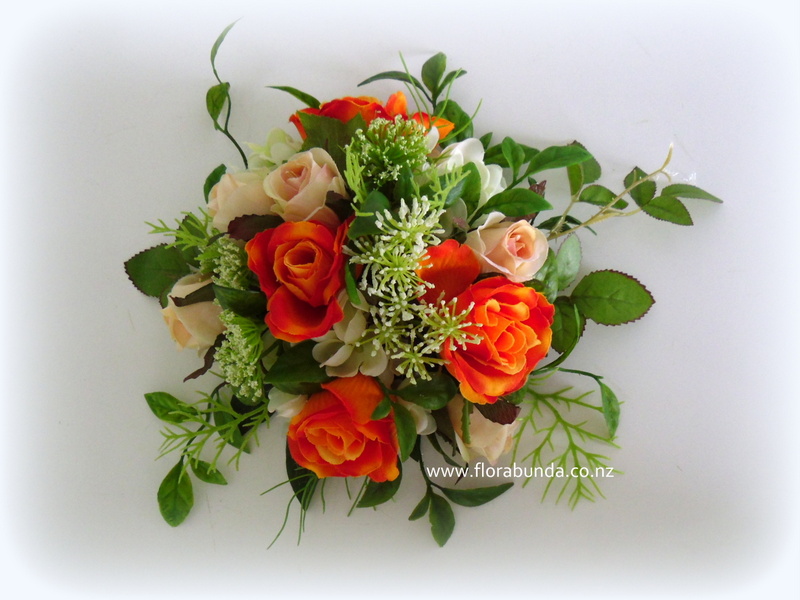 orange and green leaves cake flower