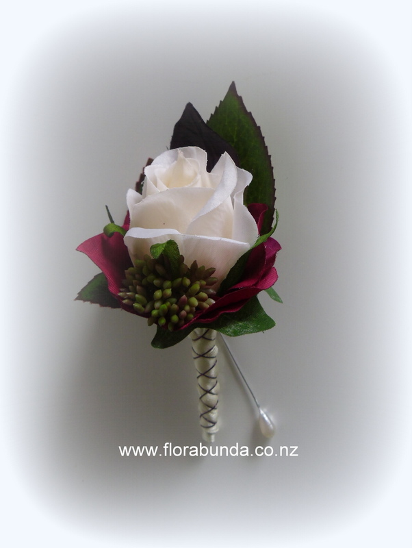 Ivory & burgundy man's artificial buttonhole