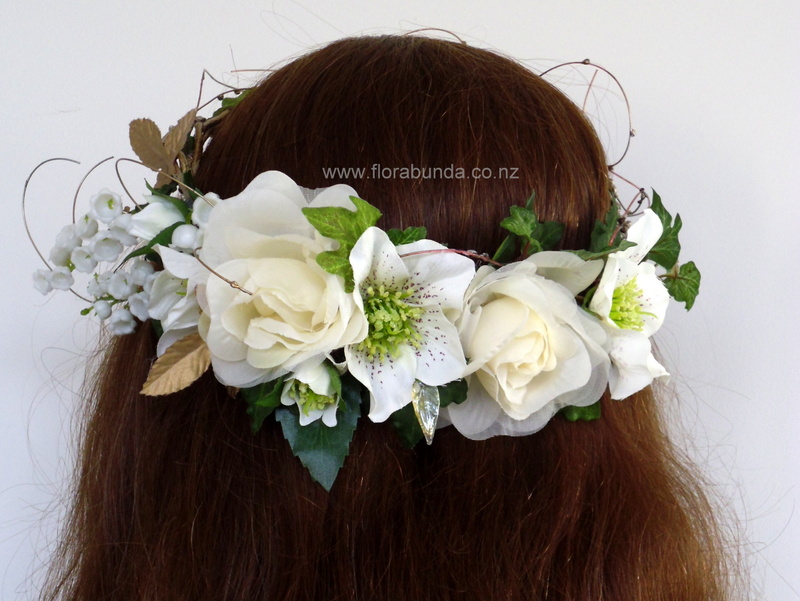 Shows flower focal being worn at the back.