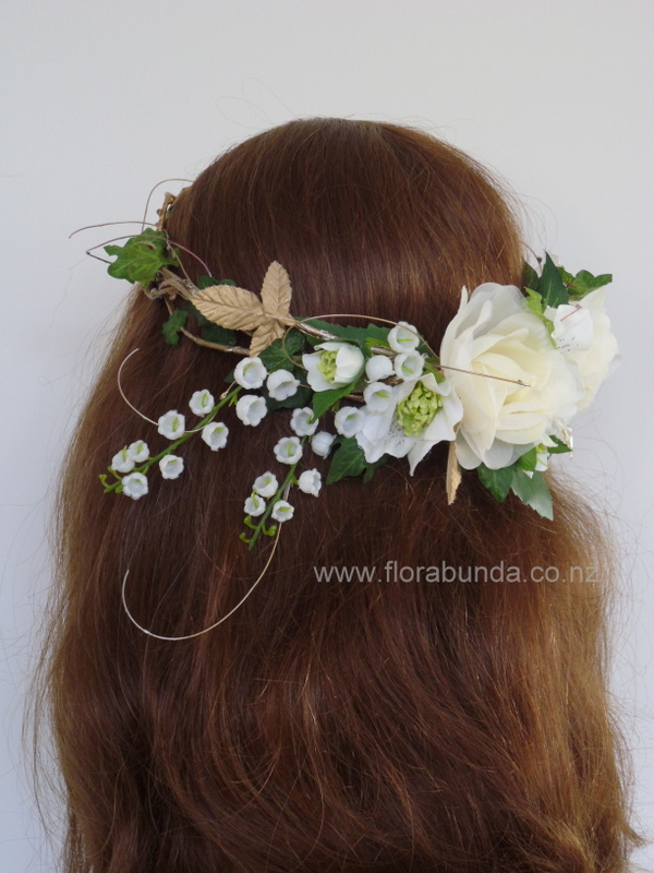 Shows flower focal being worn to the side.